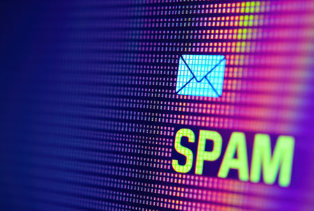 Pixel cursor and âSPAMâ icon. A clear warning about unwanted emails.の素材