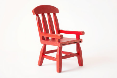 A weathered, red painted wooden chair with a backrest and armrests, presented against a plain white background.の素材