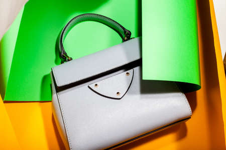 Fashionable shoulder bag on a stylish bright backgroundの写真素材