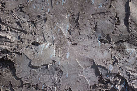 texture of sloppy plastered wall with white paint drops. background
