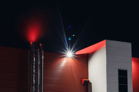 Red smoke from the chimneyの写真素材