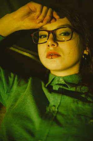 Portrait of a sexy red-haired girl. Art photo processing.の写真素材