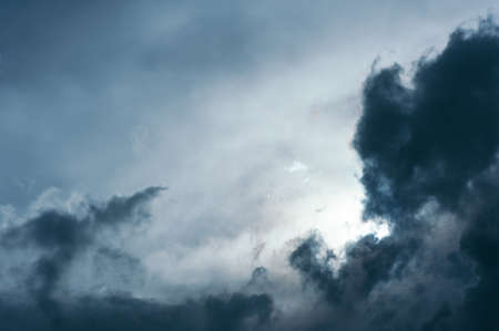 Stormy dark clouds. Thunderous sky. Rainy weather.の写真素材