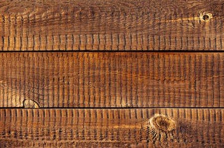 Horizontal wooden boards in the sunlight. Wooden texture.の写真素材
