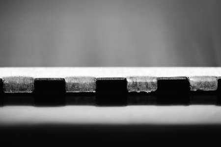 Metallic conceptual object close-up in blur. Steel texture close-up.の写真素材