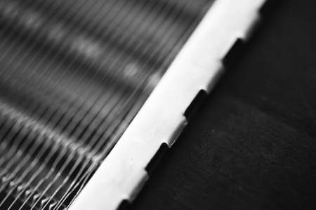 Part of the radiator for cooling the engine close-up. Steel texture.の写真素材