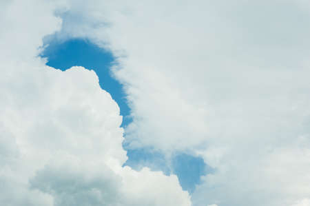 Cumulus clouds in a clear blue sky. Aerial clouds.