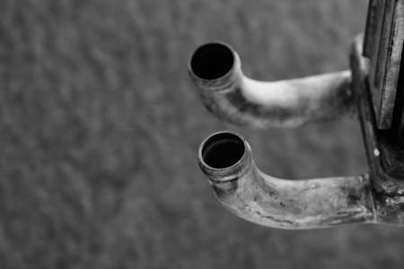 Funny copper tubes, looking like eyes, look up. Black and white.の写真素材