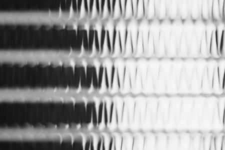 Blurred metal surface. Steel texture. Transparent fluted glass.の写真素材