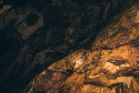 The beginning of the underground tunnel. Entrance to the dark cave.の写真素材