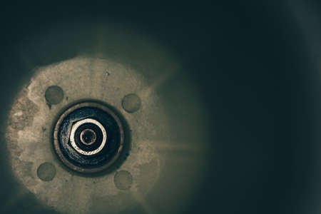 The nut holds the plastic surface on the stem. Vintage mechanism. Retro device.の写真素材