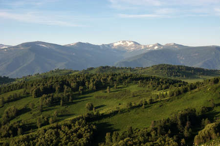 Mountain landscape. At a distance you can see the snow on top of the mountain.