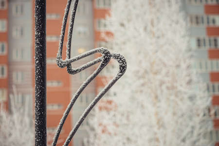 Part of the vintage street pillar with forged wavy pattern.の写真素材