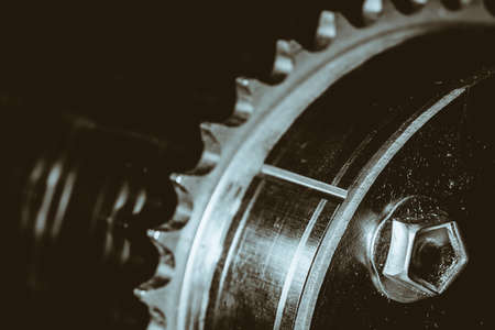 Monochrome background image of gear close up. Artwork from auto part in macro photography.の写真素材
