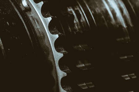 Monochrome background image of gear close up. Artwork from auto part in macro photography.の写真素材