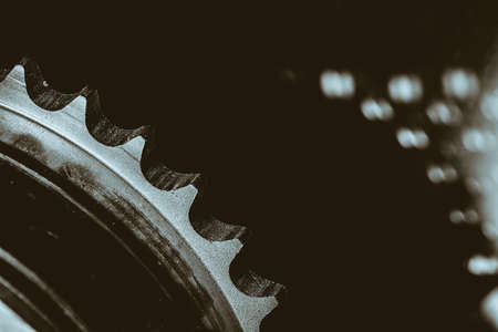 Monochrome background image of gear close up. Artwork from auto part in macro photography.の写真素材