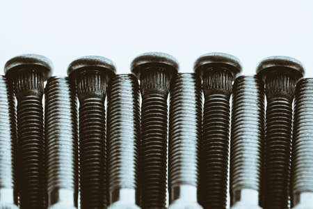 Monochrome artwork from automotive bolts close up.の写真素材