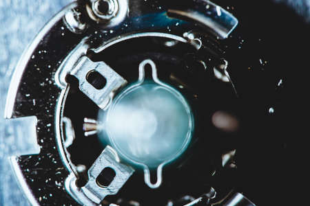 Appearance of alien spaceship from wormhole. Abstract image of space weapon of future. Spaceship appears from big blue portal. Background image of destructive power of extraterrestrial cosmic weapon.の写真素材