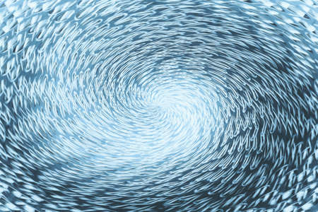 Blue wormhole in form of spiral absorbs space. Fantastic background image of asymmetric vortex tunnel in center of shot.の写真素材