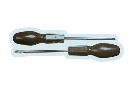 Isolated image of flat and cross screwdrivers. Flathead and crosshead screwdrivers on white background. Two handy tools.の写真素材