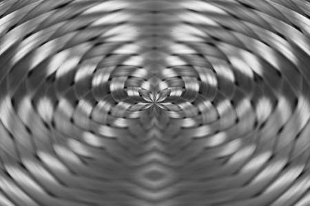 Symmetrical silver metallic wicker texture close-up. Detail background of volume steel surface. Abstract gray braided wire in macro. Surreal shape with copy space. Unusual black and white space.の写真素材