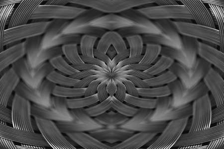 Symmetrical silver metallic wicker texture close-up. Detail background of volume steel surface. Abstract gray braided wire in macro. Surreal shape with copy space. Unusual black and white space.の写真素材