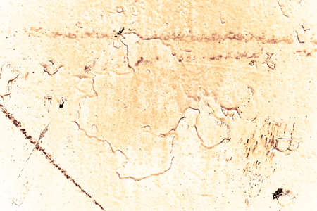 Vintage yellow background. Rough painted wall of aspen gold color. Imperfect plane of golden...