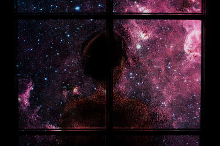 Dark silhouette of child alone in isolation behind glass door. Abstract image of sadness, apathy,...