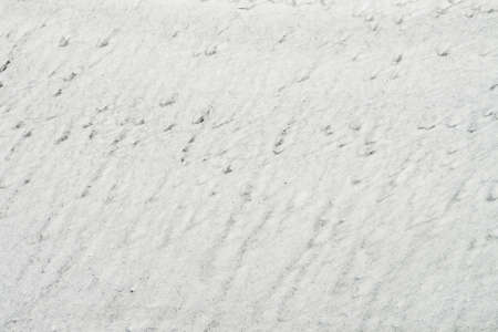 Nature backdrop with firn wall close up. Minimalist natural background with minimal snow surface....