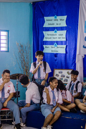 Muntilan, Indonesia - 17 Mar 2026: Diverse Indonesian high school students laughing and enjoying a...