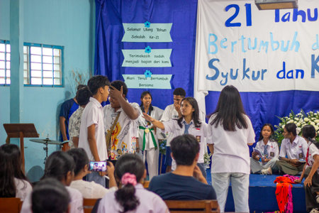 Muntilan, Indonesia - 22 Mar 2026: Indonesian high school students performing a drama skit on stage...