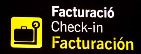 Brightly light Check-in airport information sign 