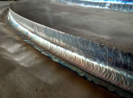 Welding of stainless steel with argon arc welding. Welding T.I.G. Color welding seam. high quality...
