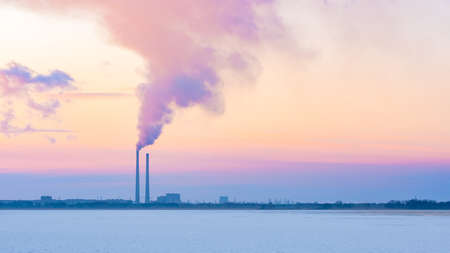 Environmental pollution by industrial waste. Emission of harmful substances into the atmosphere. Pipes of plant. high quality photoの写真素材