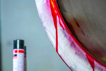 Detection of minor defects after the end of welding work. Testing of welded joints with a penetrating liquid. high quality photoの写真素材