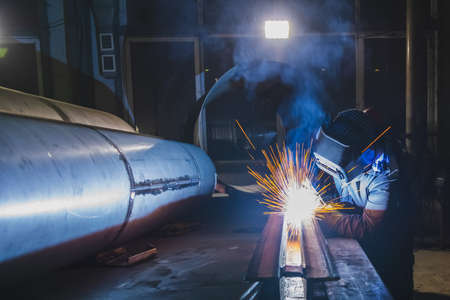 Welding of metal structures by semi-automatic arc welding. MIG welding. high quality photoの写真素材