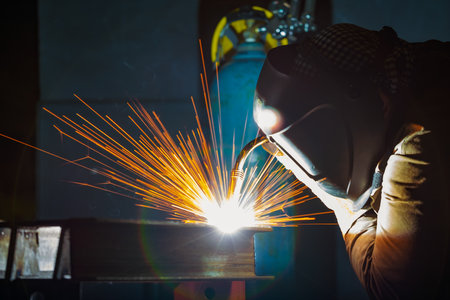 Welding of metal structures by semi-automatic arc welding. MIG welding. high quality photo
