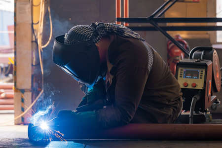 pipe welding. Semi-automatic arc welding. MIG welding. high quality photoの写真素材