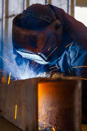 Welding of metal structures by semi-automatic arc welding. MIG welding. high quality photo