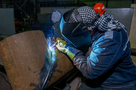 pipe welding. Semi-automatic arc welding. MIG welding. high quality photoの写真素材