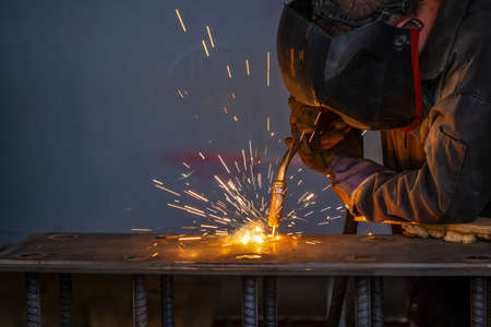 Welding of metal structures by semi-automatic arc welding. MIG welding. high quality photoの写真素材
