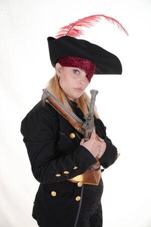 carribean girl pirate in the black background look the cameraの写真素材