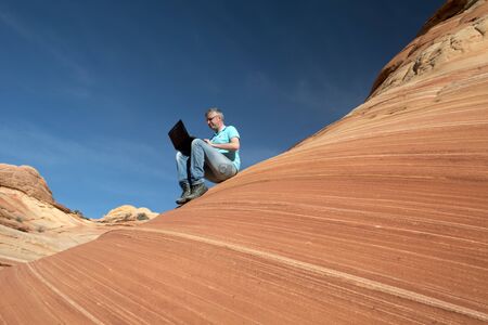 Businessman, Paria Canyon, Vermilion Cliffs, Arizonaの写真素材