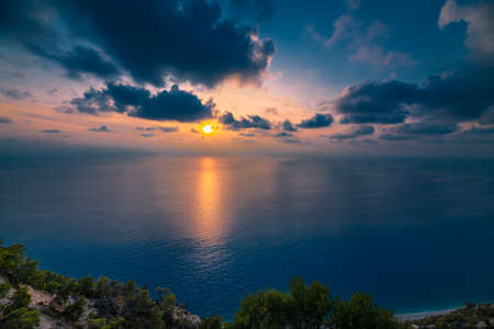 Mystical sun rays from a dramatic cloudy sky