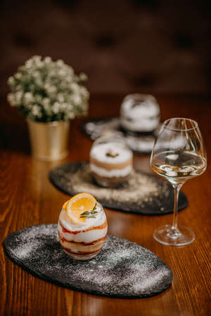 Delicious cake with coffee, wineの写真素材