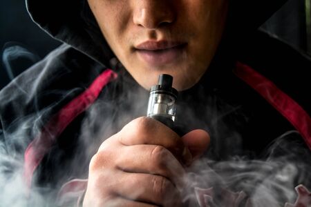 A man using electronic cigarette