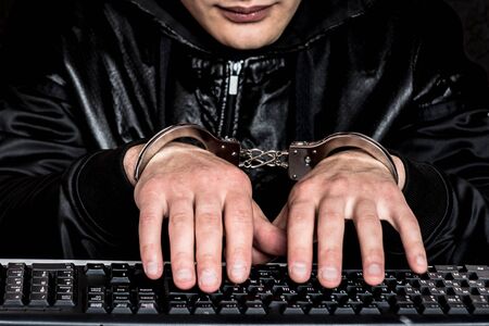 A hacker breaks into the security systemの写真素材