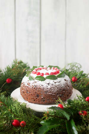 Christmas cake or pudding in festive decoration. Selective focus.の写真素材