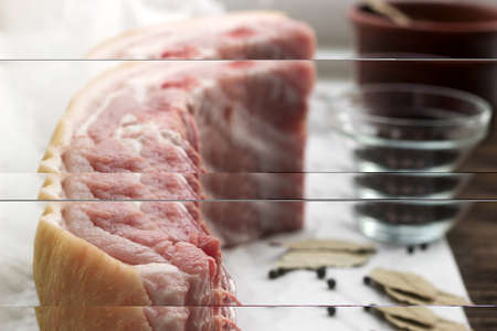 Raw fat pork belly on white paper. Selective focus.の写真素材