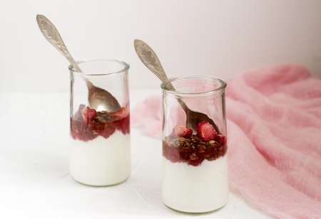 Yogurt with granola and strawberries. Selective focus.の写真素材